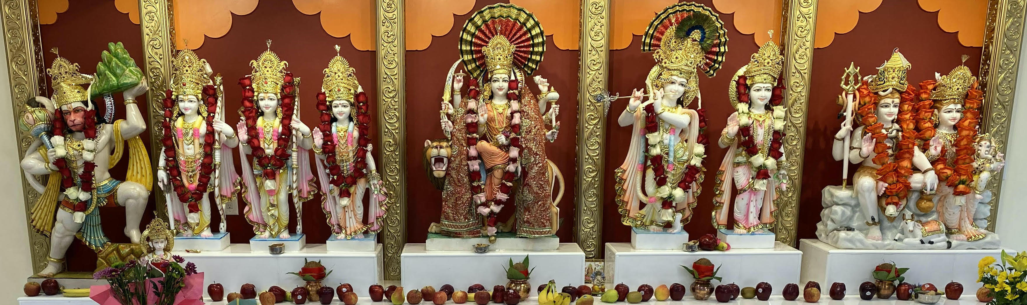 Hindu Temple Of Long Island view with the parking lot